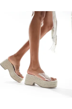 ASOS Sandalias transparentes con cuña y diseño de tiras cruzadas Toy de