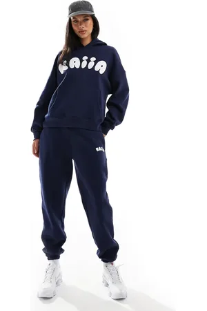 Kaiia Joggers con bajos ajustados y logo en relieve de (parte de un conjunto)