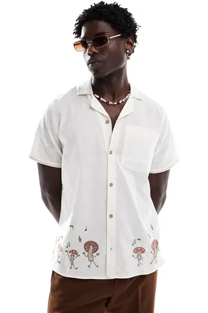 Hollister Camisa color crema de manga corta con diseño de setas bordadas de -Blanco
