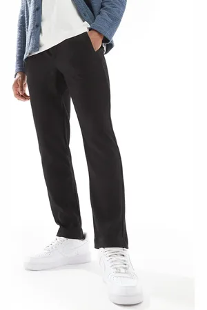River Island Pantalones negros plisados de