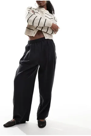 ASOS Pantalones lavado de estilo casual sin cierres con pinzas premium de