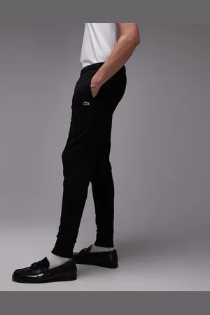 Lacoste Pantalones de chándal negros de corte slim con logo de
