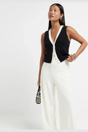 River Island Pantalones color de pernera ancha con pinzas de Petite-Blanco