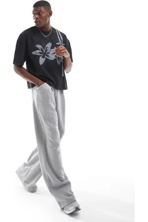ASOS Joggers gris jaspeado de pernera muy ancha con pinzas de