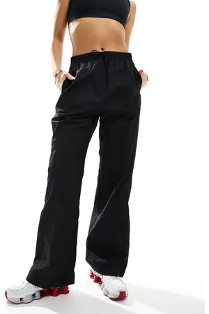 Nike Pantalones de chándal negros Windrunner de