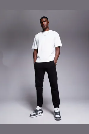 Armani Exchange Joggers negros con bajos ajustados y logo de