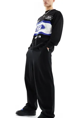 COLLUSION Joggers negros de corte skater holgados de