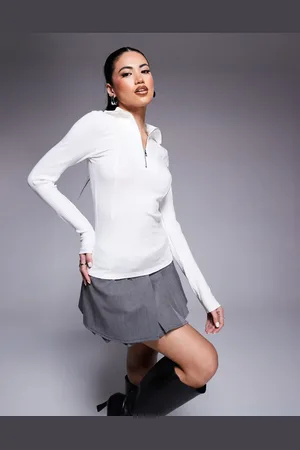 River Island Top de manga larga con cremallera delantera de canalé de