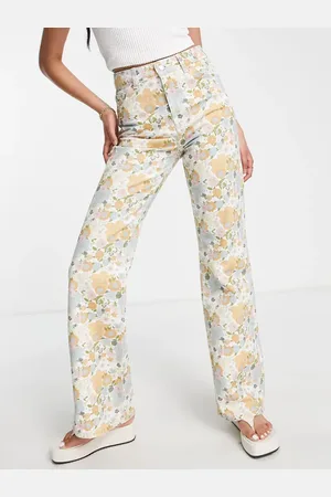 Topshop Vaqueros multicolores de corte acampanado estilo años 90 con estampado floral retro de