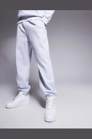 The North Face Joggers grises básicos extragrandes con logo Essential de