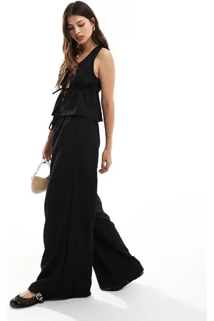 Esmée Pantalones playeros negros texturizados exclusivos de (parte de un conjunto)