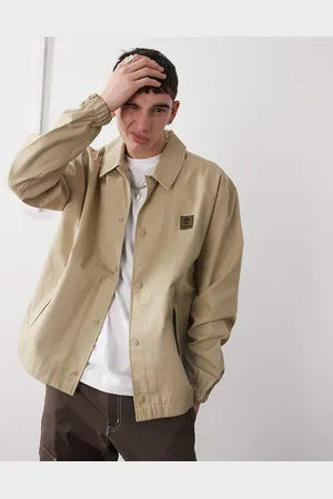 Timberland Chaqueta beis de estilo entrenador con logo en el pecho de tejido antidesgarros de -Neutro
