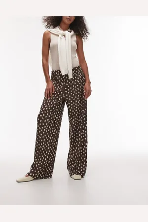 Topshop Pantalones marrones plisados de pernera ancha con estampado de lunares de