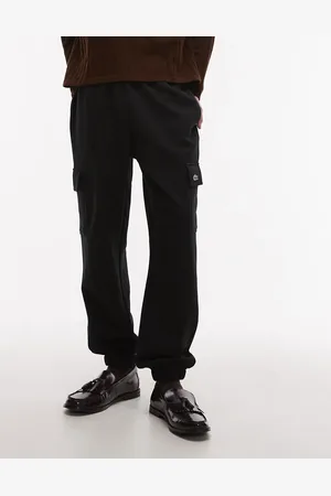 Lacoste Joggers negros con bolsillos cargo de