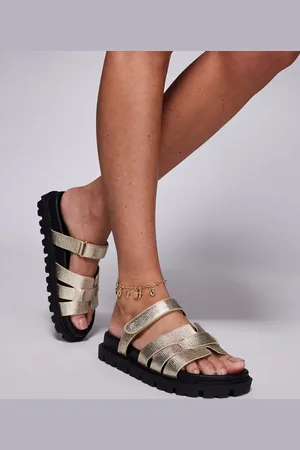Simmi London Sandalias doradas planas con diseño de bandas de rafia Adelle de Simmi London-Dorado