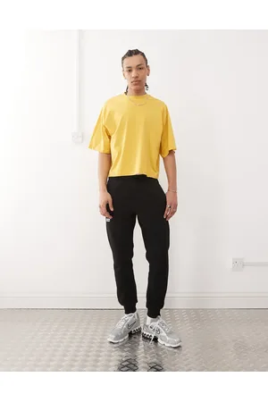 A Bathing Ape Joggers negros con bajos ajustados y logo en el lateral de -Neutro