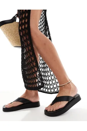 Schuh Chanclas negras con plataforma plana de cuero Tanisha de