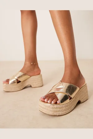 ASOS Cuñas doradas con correas cruzadas Toy de