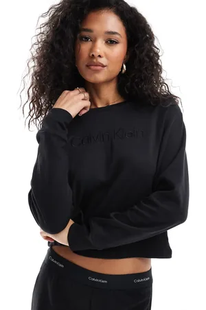Calvin Klein Sudadera negra holgada con logo y cuello redondo Modern Terry de