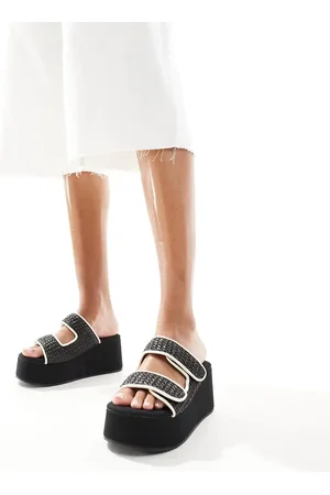 ASOS Mules negros con detalle entretejido y plataforma plana Teenager de