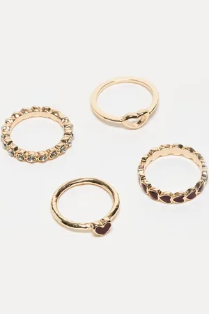 ASOS Pack de 4 anillos dorados con diseño de corazón de