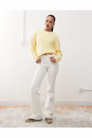 Wrangler Vaqueros blancos de corte acampanado con bolsillos delanteros de