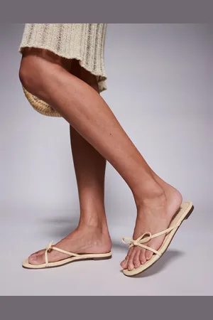 Simmi London Sandalias pastel planas con detalle de lazo Char de SIMMI London