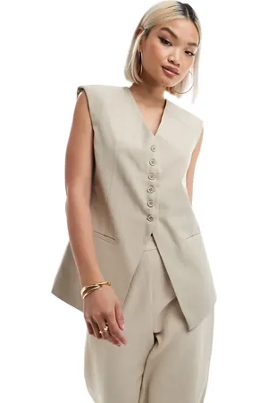 ASOS Chaleco largo color con hombros muy marcados de -Beis neutro