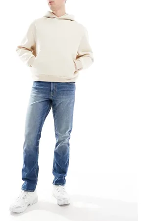 ASOS Vaqueros de corte slim en de