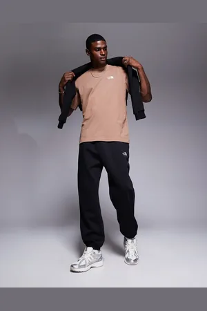The North Face Joggers negros extragrandes con logo Essential de