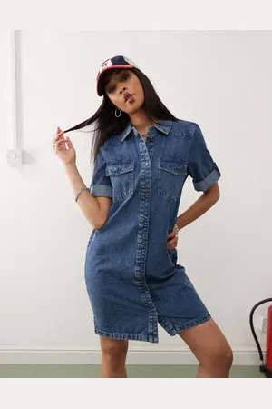 Noisy May Vestido vaquero corto con lavado azul medio y mangas vueltas de