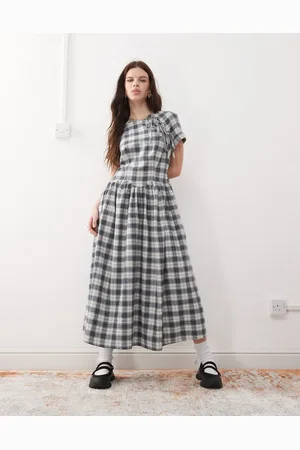 Reclaimed Vestido midi a cuadros con detalle de lazadas en la parte delantera de