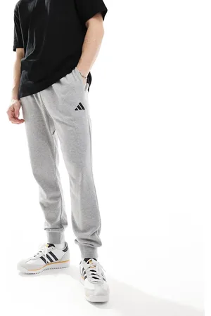 adidas Pantalones gris medio jaspeado y negros de felpa rizada Feel Cozy de adidas Essentials