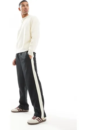 JACK & JONES Pantalones de chándal negros de corte suelto con banda lateral Karl de