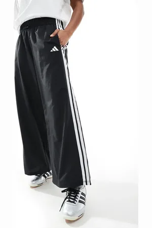 adidas Pantalones negros y blancos estilo paracaidista con 3 rayas Essentials de adidas