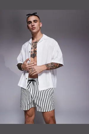 ASOS Shorts de baño cortos a rayas blancas y negras de sirsaca de -Blanco