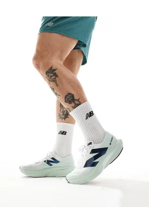 New Balance Zapatillas de deporte grises Fuelcell Rebel V4 de Running