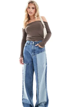 Miss Selfridge Vaqueros azul lavado holgados con diseño de parches de