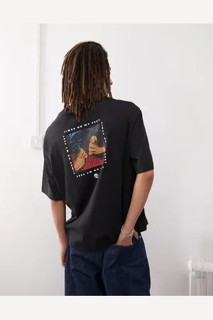 Timberland Camiseta negra extragrande con estampado gráfico "On my feet" de