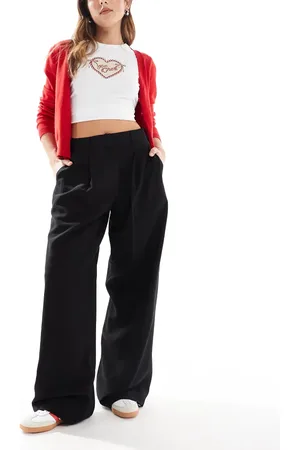 AWARE Pantalones dad de sastre negros de tejido con caída de