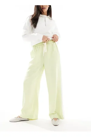 ASOS Pantalones verde sin cierres con panel en contraste de