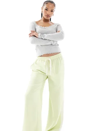 ASOS Pantalones verde sin cierres con panel en contraste de Petite