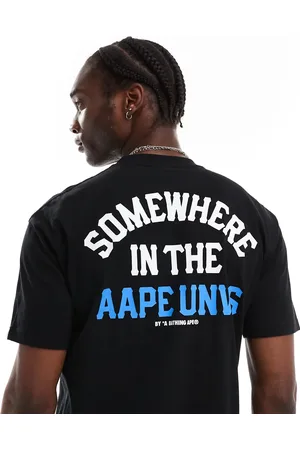 A Bathing Ape Camiseta negra con texto "Somewhere" y estampado de camuflaje en la espalda de