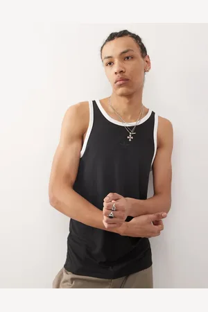adidas Camiseta negra de tirantes Premium Essentials de