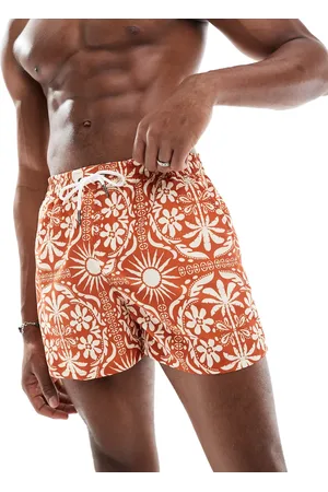 Aray Shorts de baño color óxido con estampado solar de mosaico de -Naranja