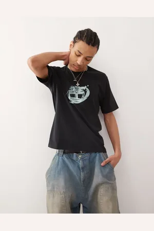 Timberland Camiseta negra con estampado gráfico del logo en el pecho de