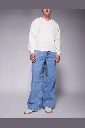 ASOS Vaqueros azules muy holgados con lavado medio y logo ADS de