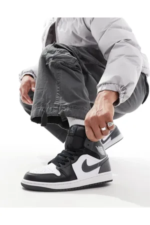 Jordan Zapatillas de deporte blancas, negras y grises Air 1 Mid de Nike