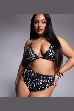 ASOS Braguitas de bikini monocromáticas de pernera y talle altos con estampado floral de ASOS DESIGN Curve-Negro