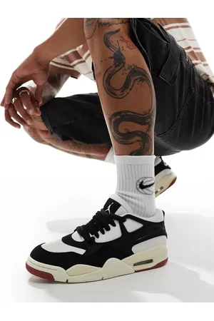 Jordan Zapatillas de deporte blancas y negras Air 4 Remastered de Nike